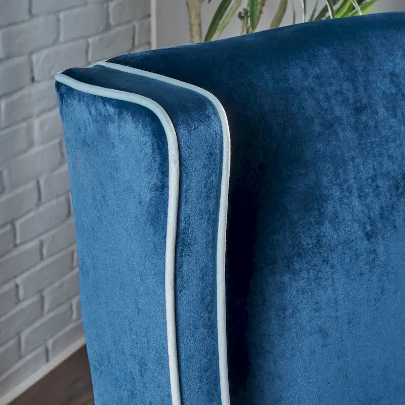 25.9 Fauteuil club en velours à dossier haut et large