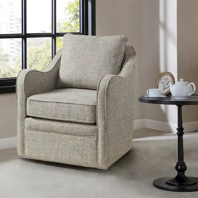 Fauteuil pivotant tapissé en tissu avec accoudoirs incurvés